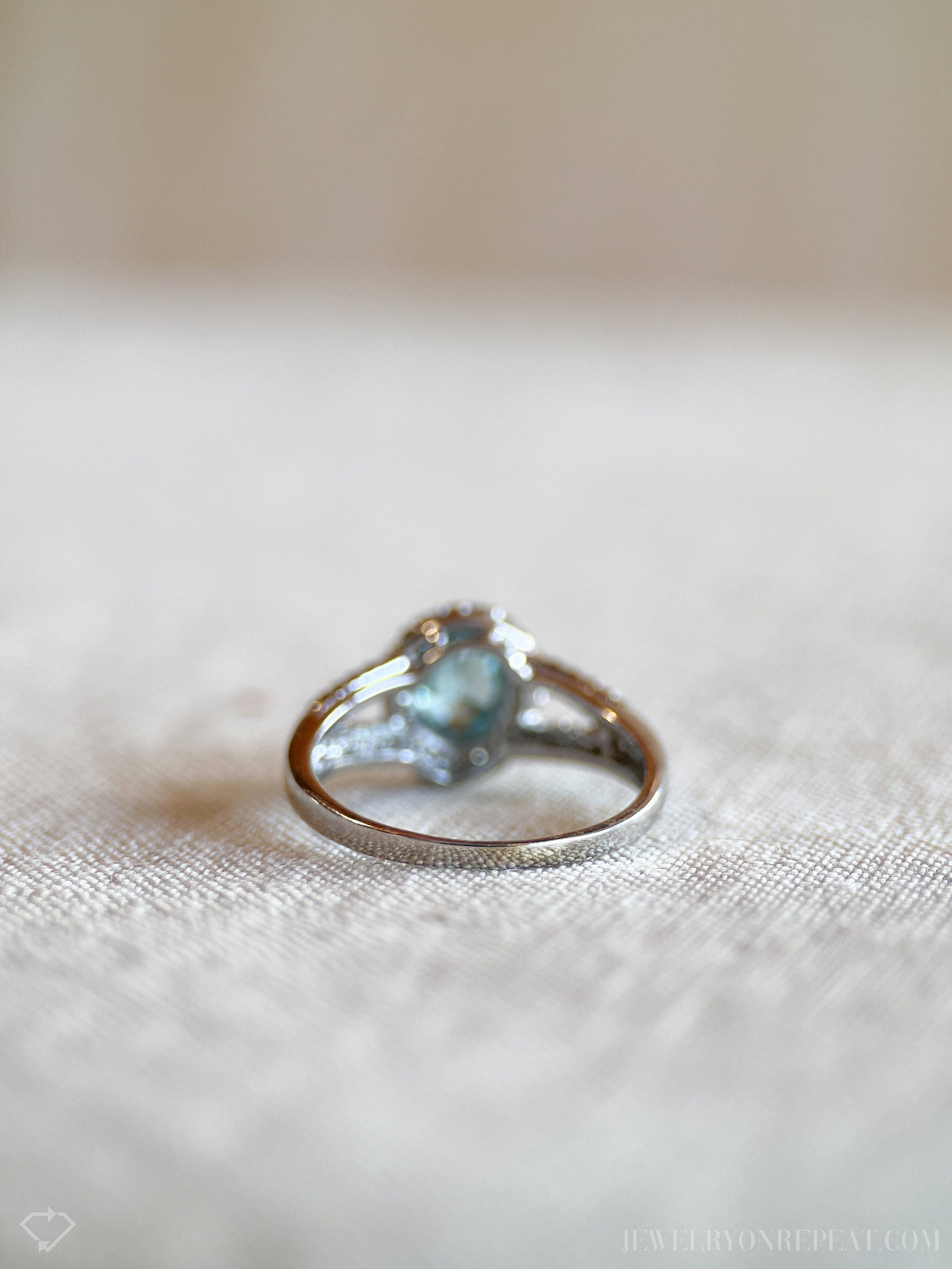 Vintage Oval Cut Blue Topaz Diamond Halo Ring in 10k White Gold, Retro Jewelry from the 1990s - Timeless, Sustainable, @JewelryOnRepeat
