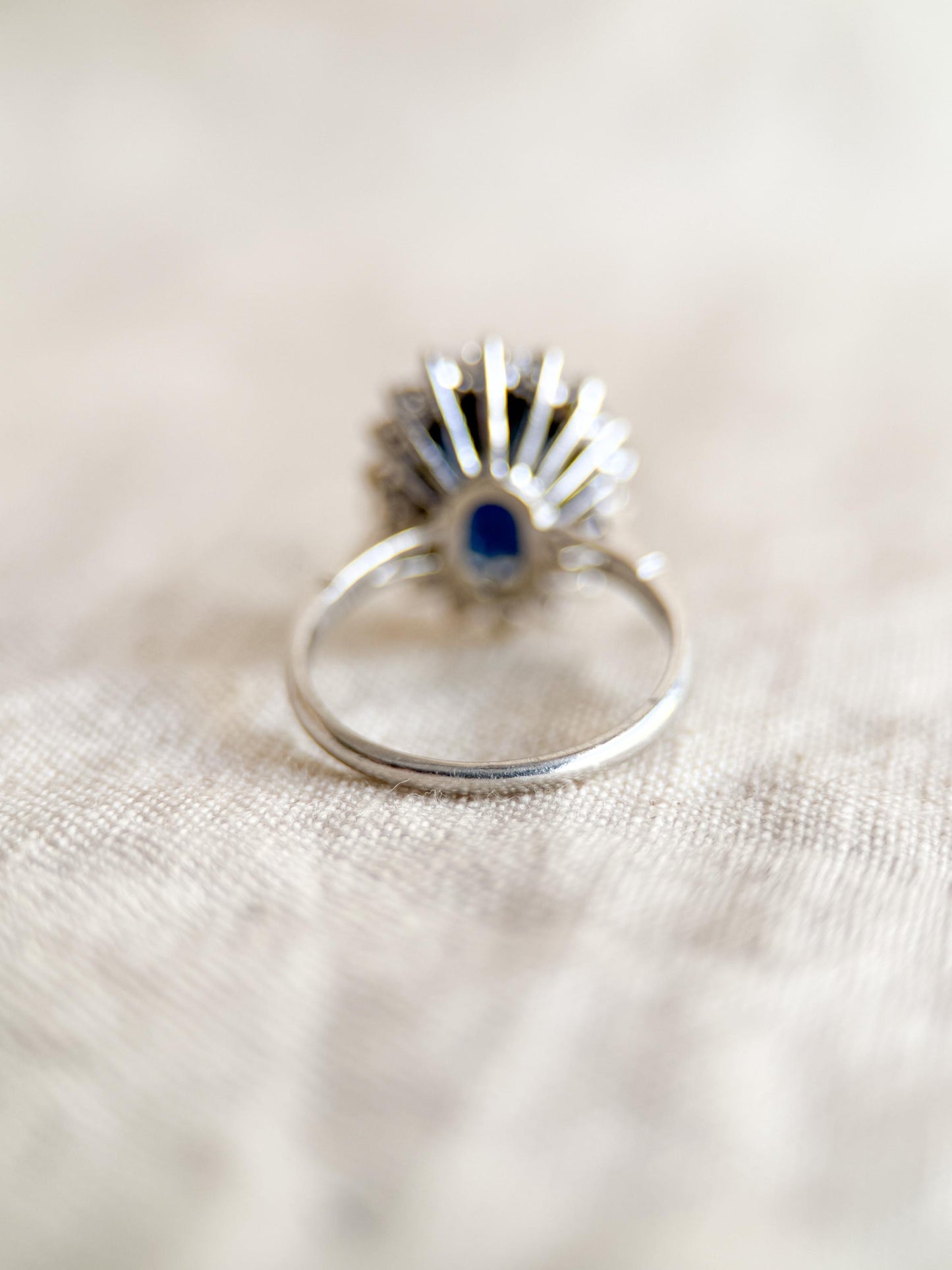 Vintage Sapphire Diamond Halo Gemstone Ring in Platinum, Retro Jewelry from the 1960s