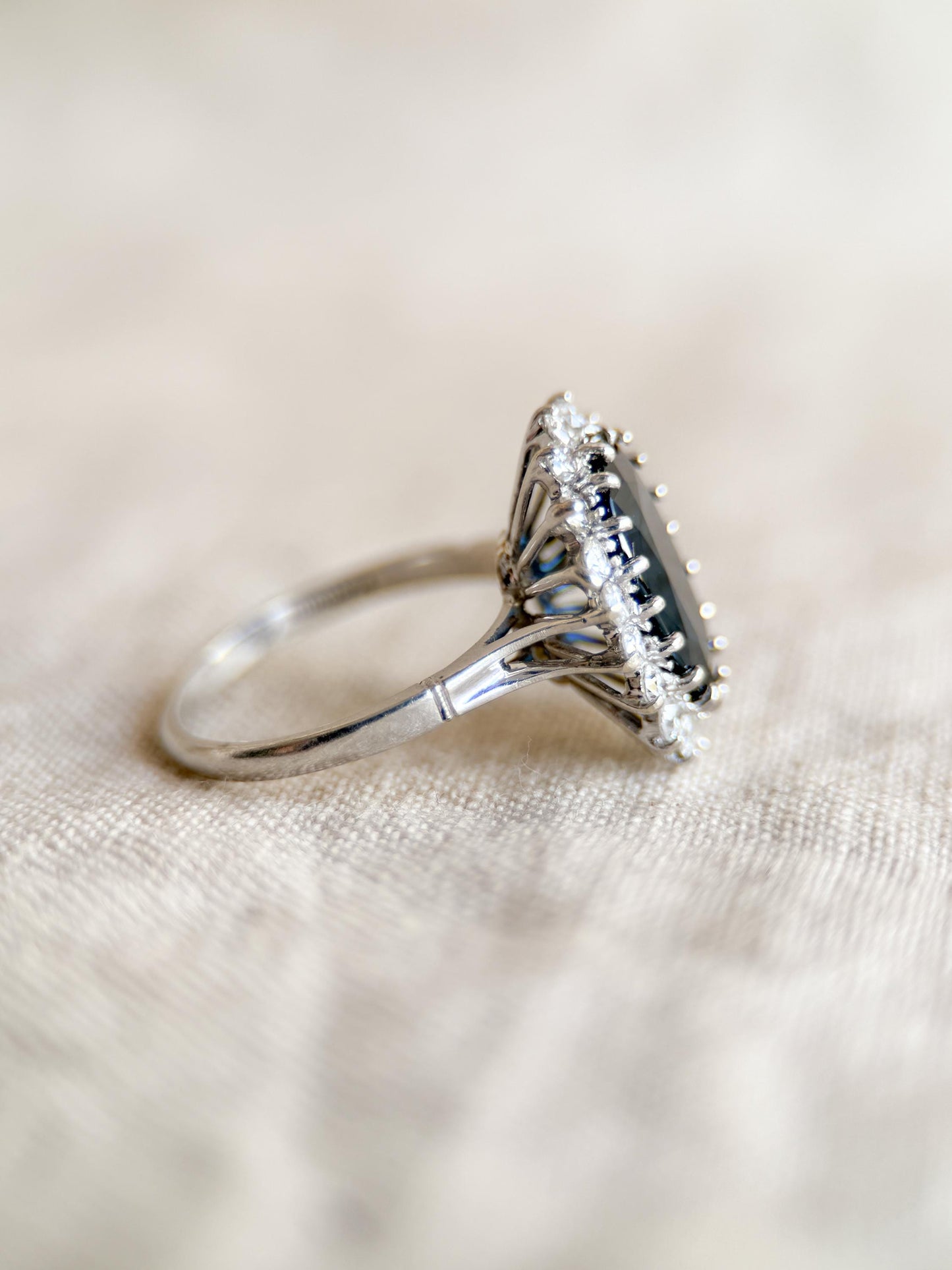 Vintage Sapphire Diamond Halo Gemstone Ring in Platinum, Retro Jewelry from the 1960s
