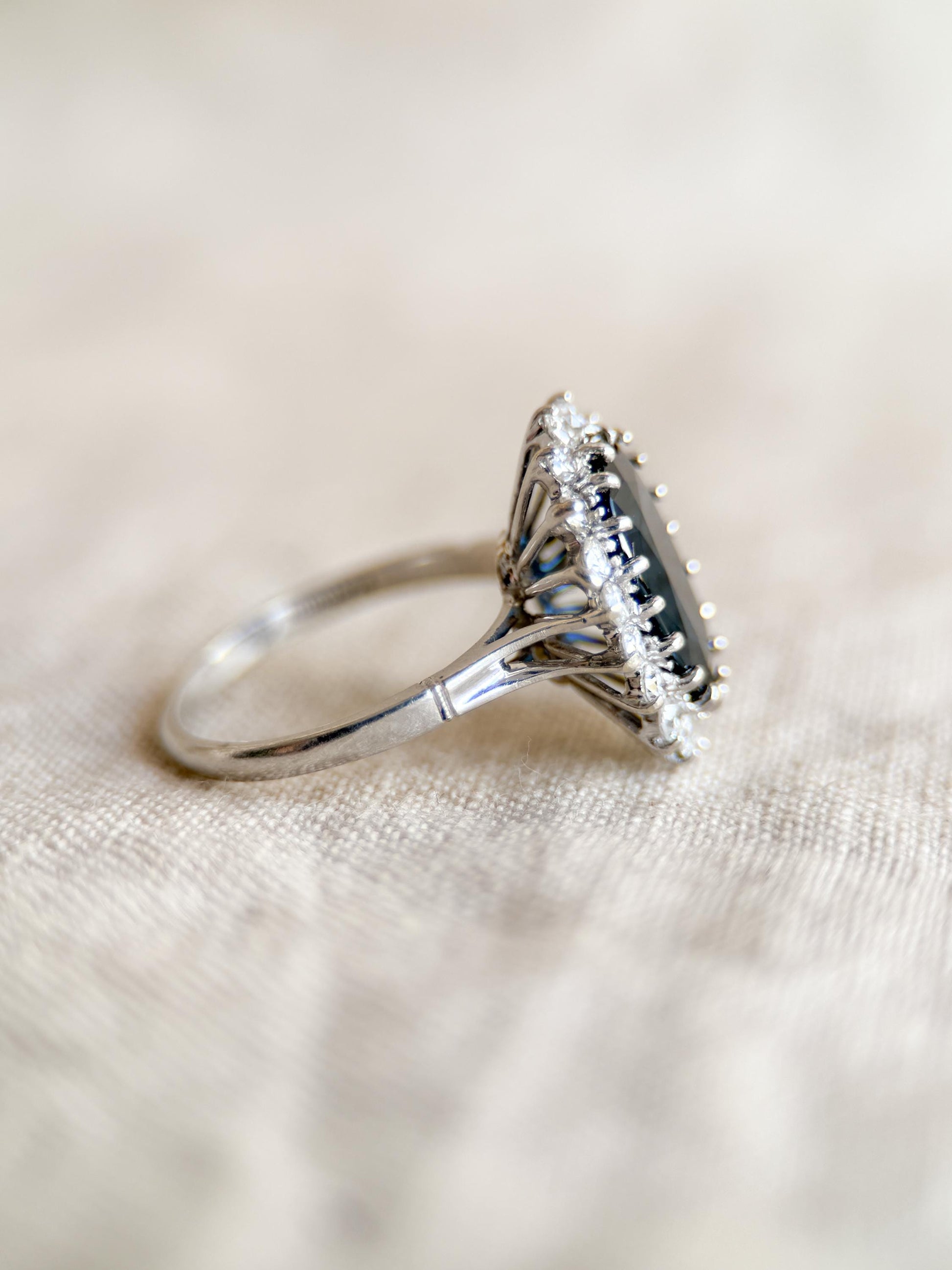 Vintage Sapphire Diamond Halo Gemstone Ring in Platinum, Retro Jewelry from the 1960s
