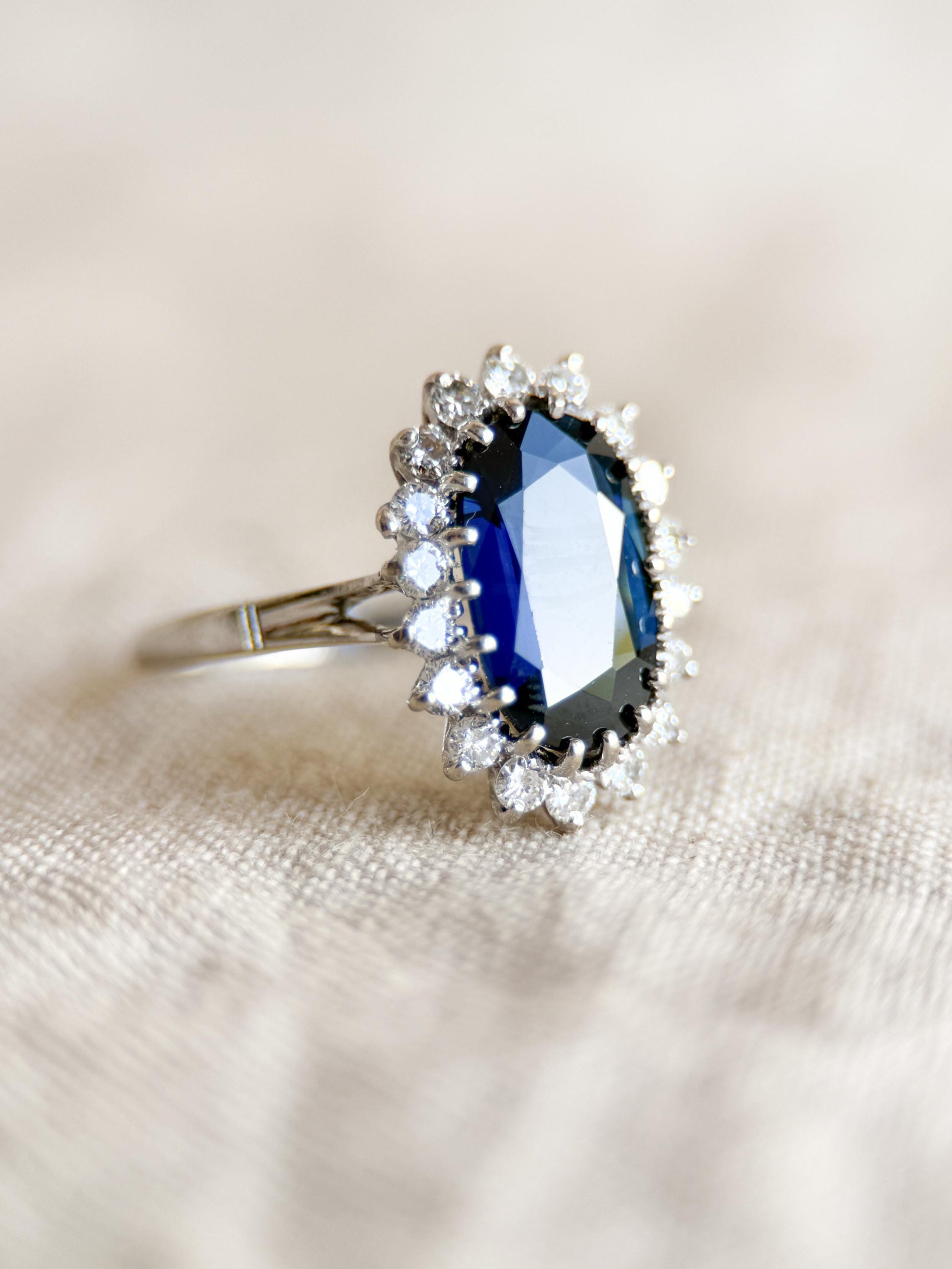 Vintage Sapphire Diamond Halo Gemstone Ring in Platinum, Retro Jewelry from the 1960s