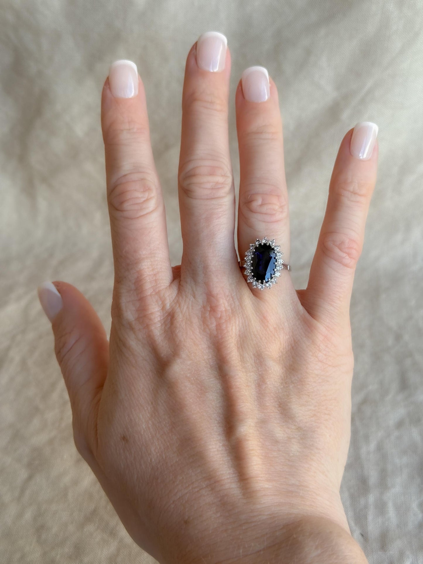 Vintage Sapphire Diamond Halo Gemstone Ring in Platinum, Retro Jewelry from the 1960s