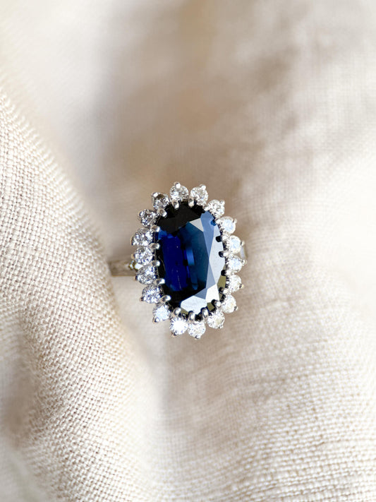 Vintage Sapphire Diamond Halo Gemstone Ring in Platinum, Retro Jewelry from the 1960s