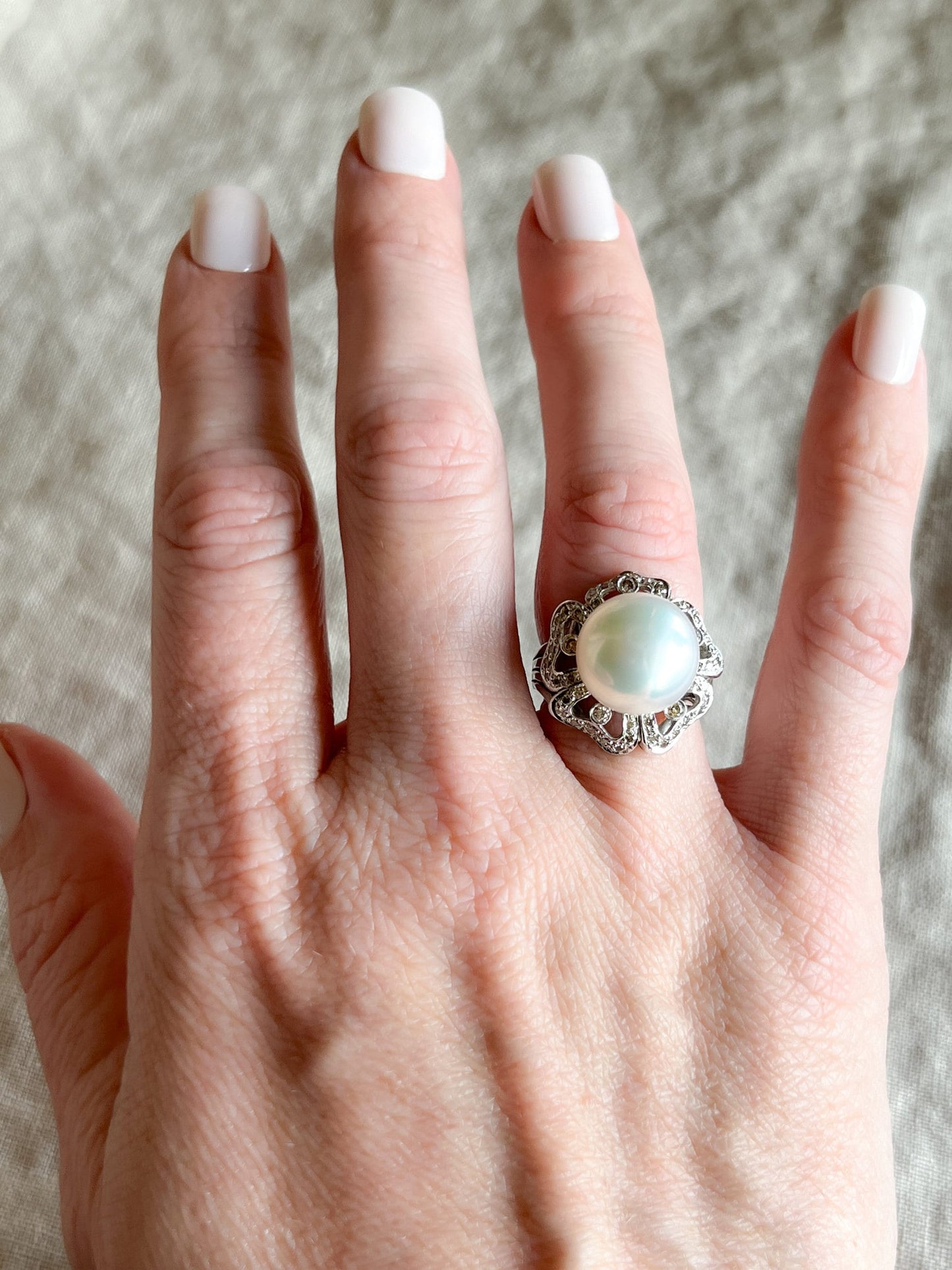 Vintage Pearl Gemstone Ring with Floral Halo in 18k White Gold