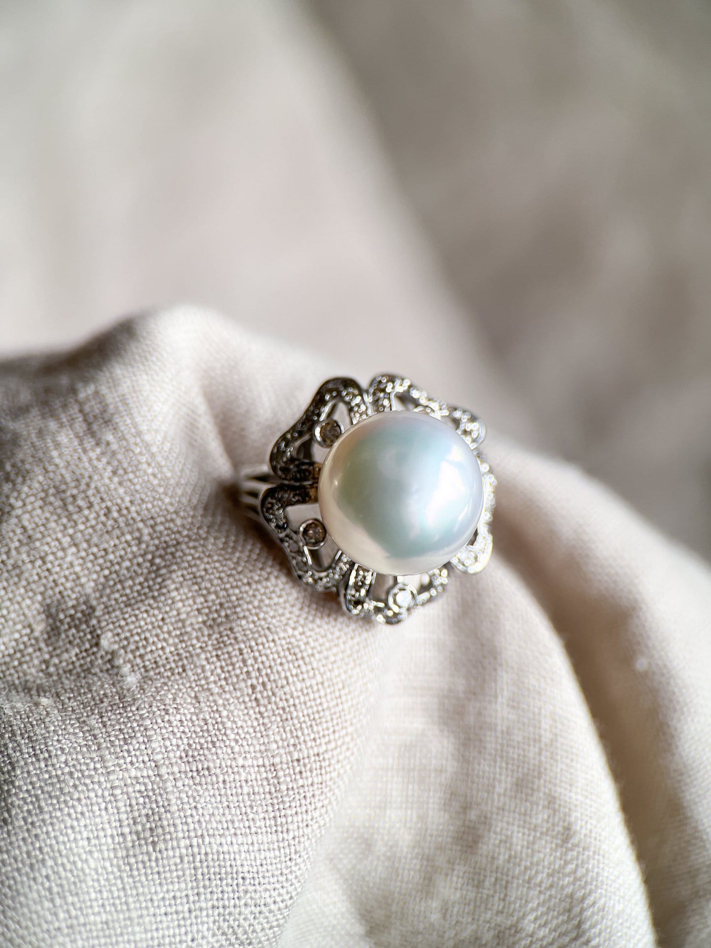 Vintage Pearl Gemstone Ring with Floral Halo in 18k White Gold