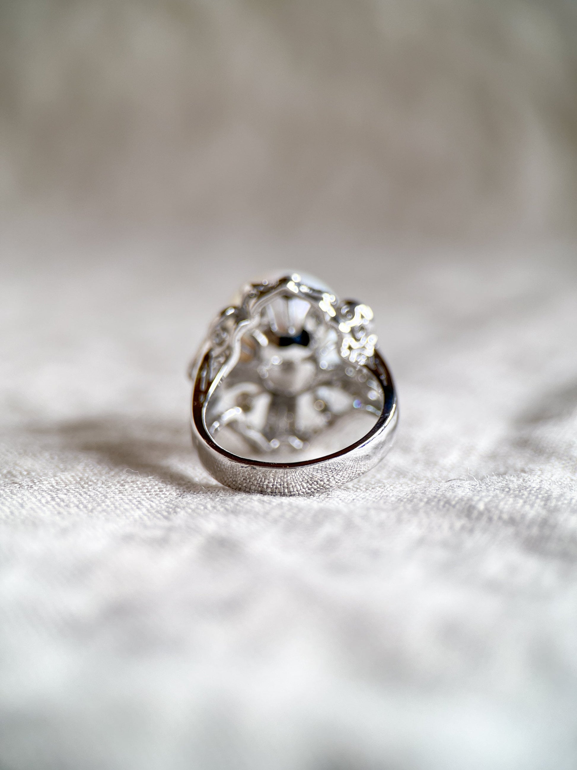 Vintage Pearl Gemstone Ring with Floral Halo in 18k White Gold