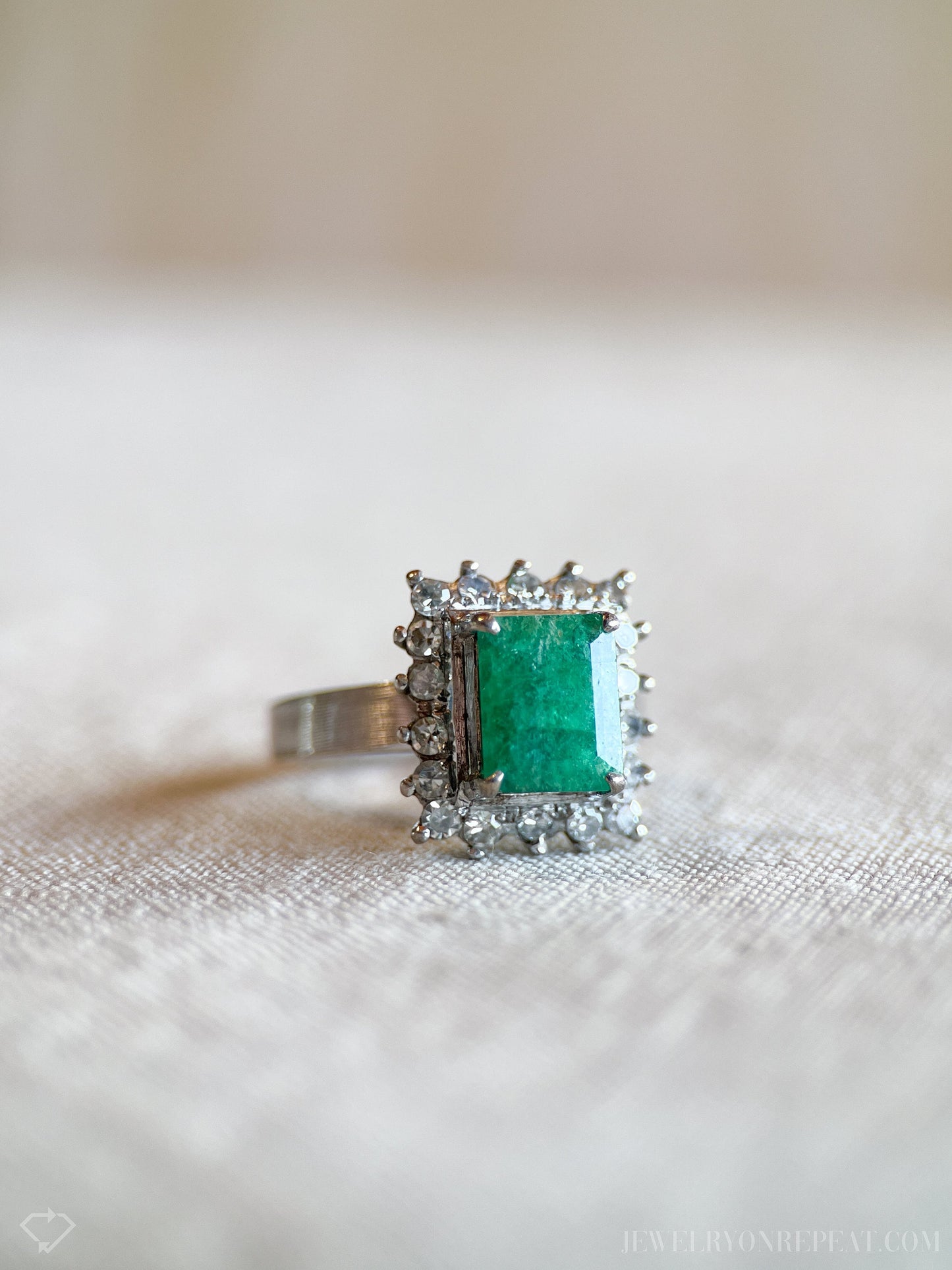 Vintage Emerald and Diamond Halo Gemstone Ring in 18k White Gold