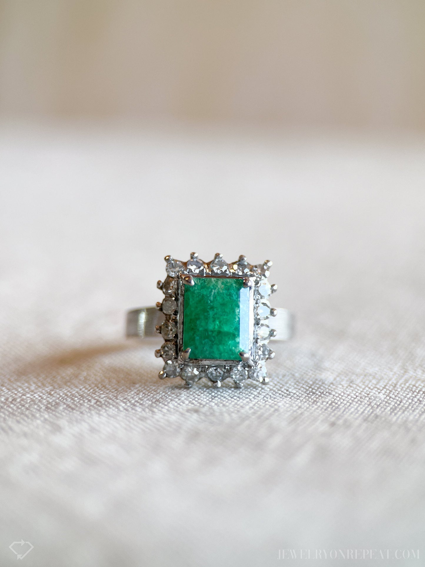 Vintage Emerald and Diamond Halo Gemstone Ring in 18k White Gold