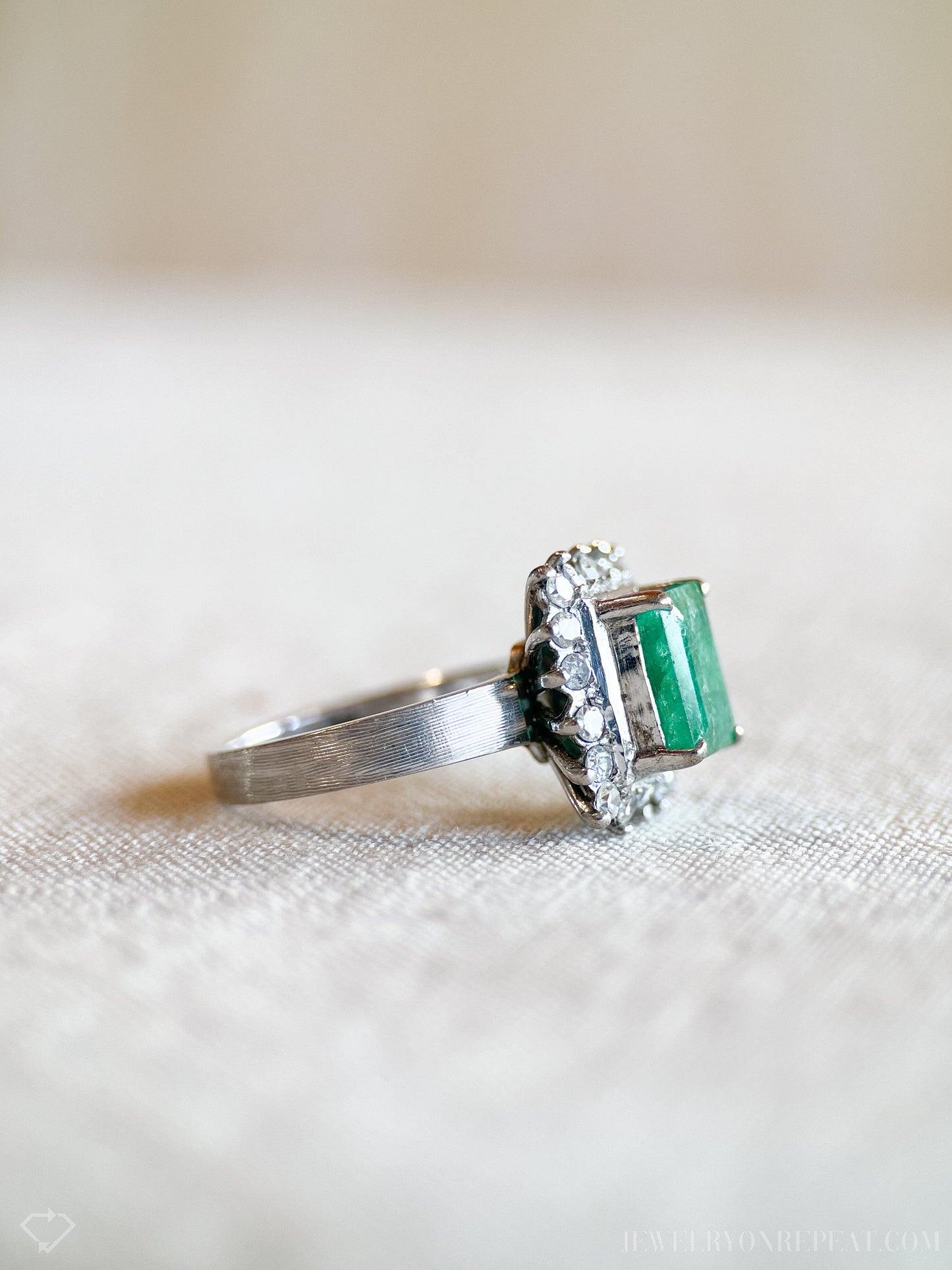 Vintage Emerald and Diamond Halo Gemstone Ring in 18k White Gold