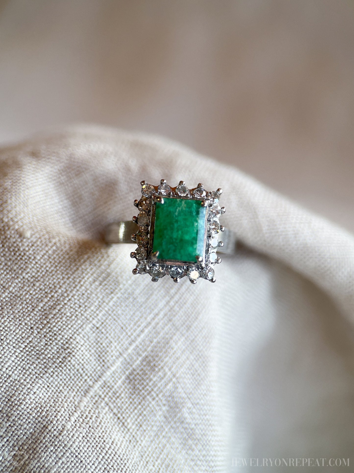 Vintage Emerald and Diamond Halo Gemstone Ring in 18k White Gold