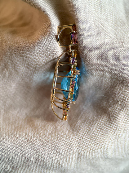 Vintage 1990s Blue Topaz Rainbow Halo Pendant, 14k Gold