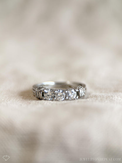 Vintage 1990s Diamond Three Stone Engagement Ring in Platinum