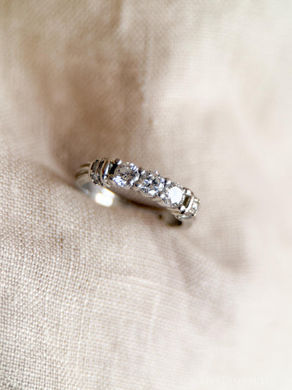 Vintage 1990s Diamond Three Stone Engagement Ring in Platinum