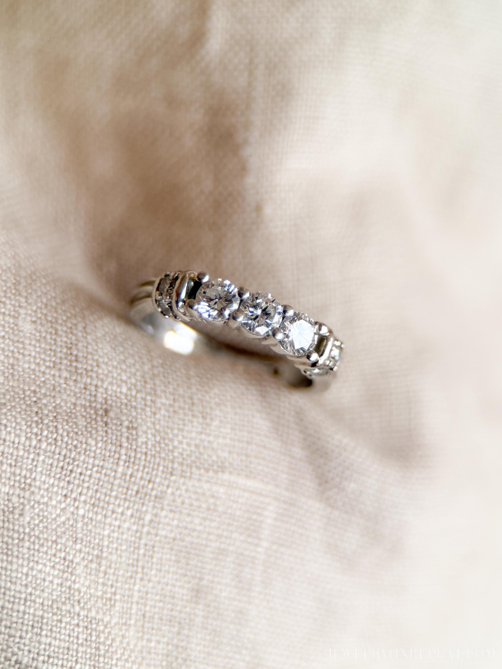 Vintage 1990s Diamond Three Stone Engagement Ring in Platinum