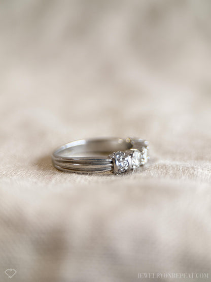 Vintage 1990s Diamond Three Stone Engagement Ring in Platinum
