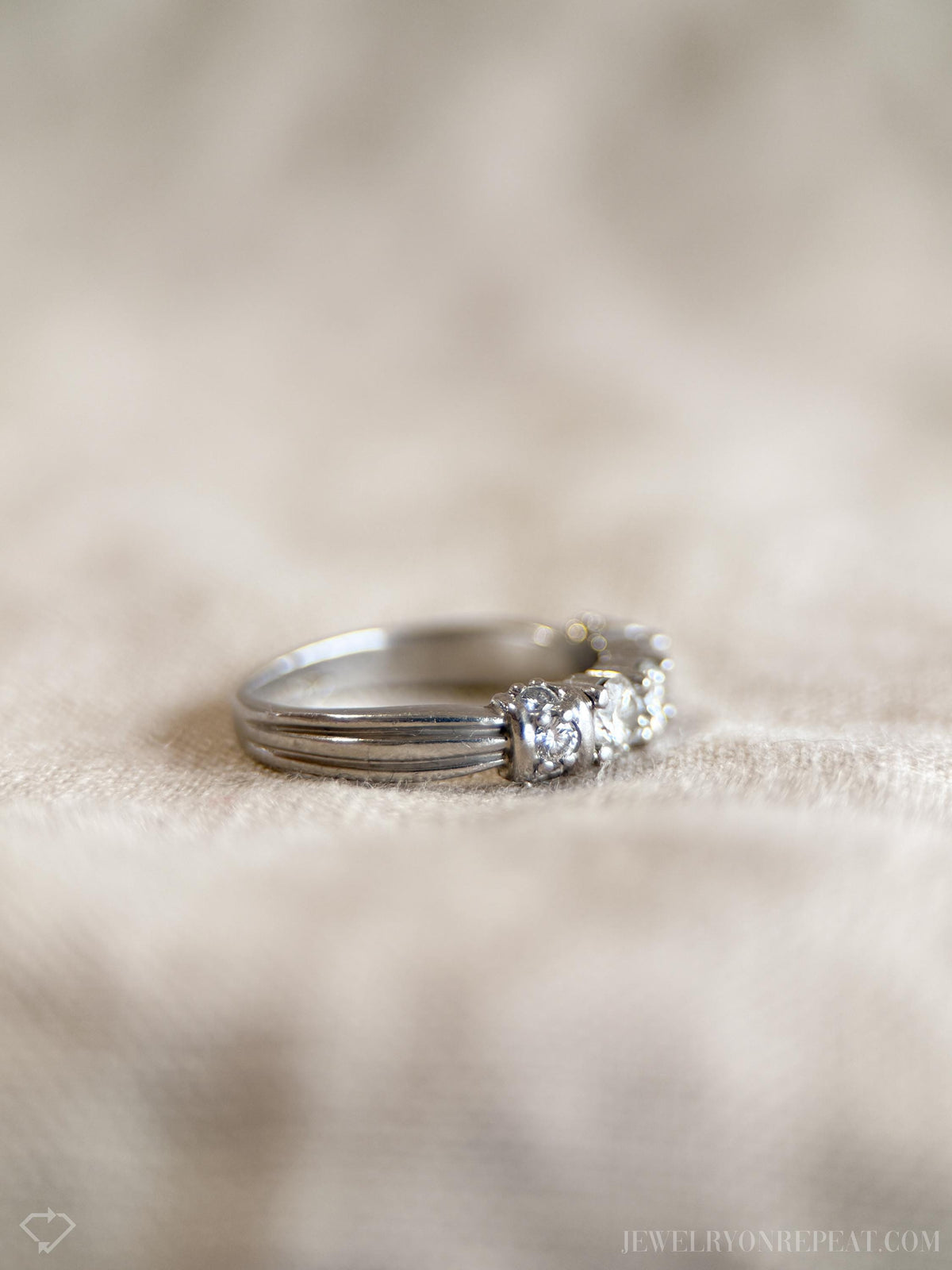 Vintage 1990s Diamond Three Stone Engagement Ring in Platinum