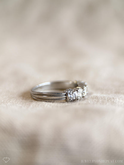 Vintage 1990s Diamond Three Stone Engagement Ring in Platinum