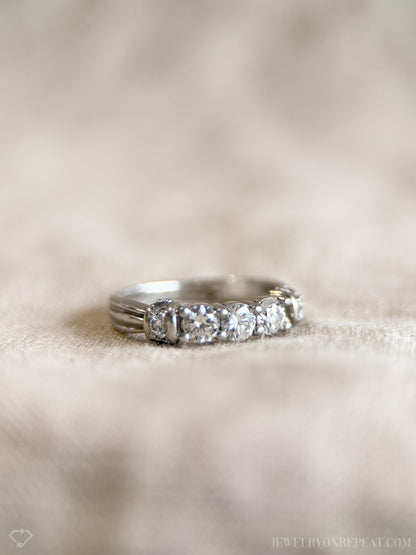 Vintage 1990s Diamond Three Stone Engagement Ring in Platinum