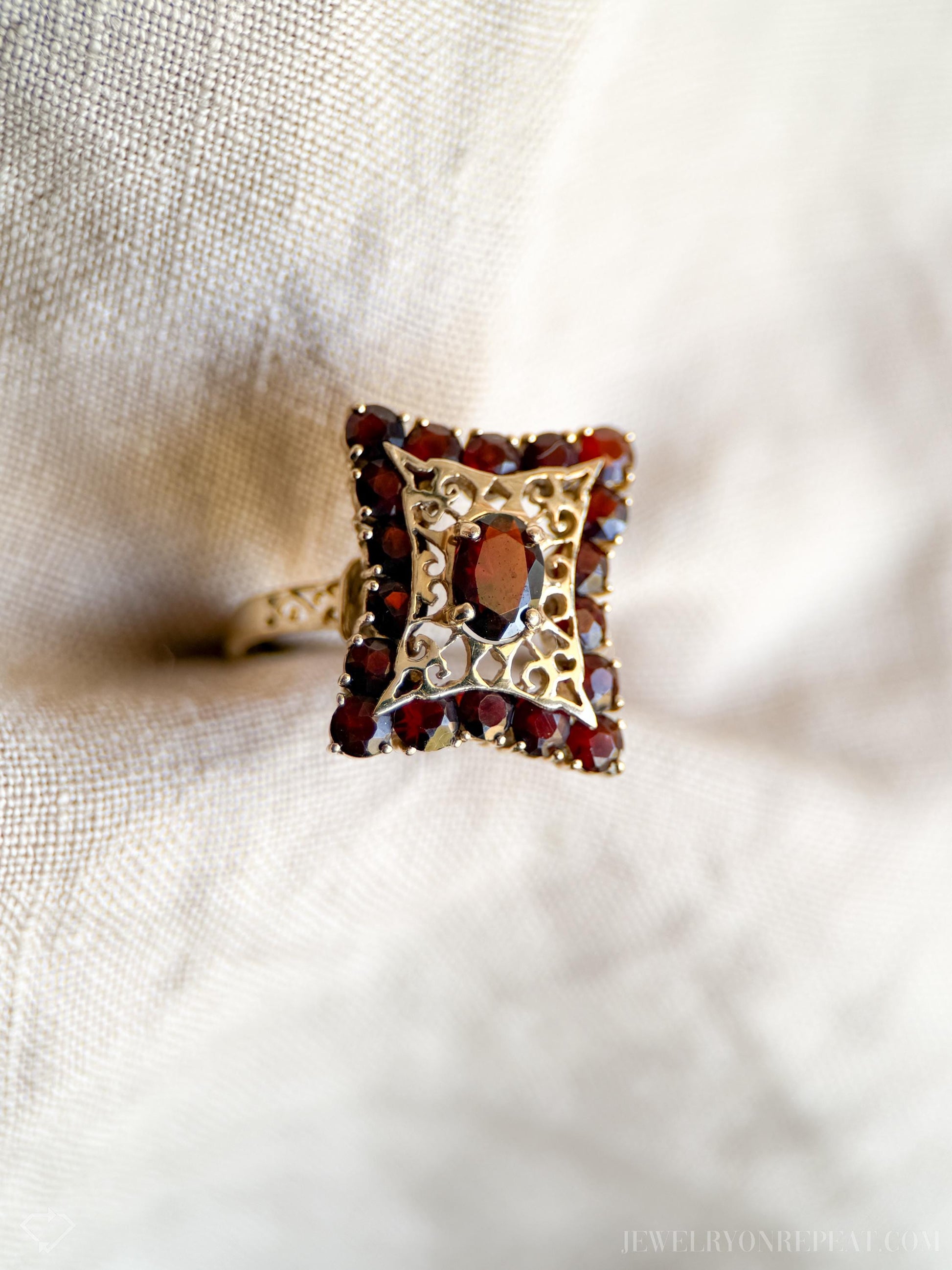Vintage Garnet Halo Gemstone Ring in 14k Gold, Vintage Jewelry from the 1980s - Timeless, Sustainable, @JewelryOnRepeat