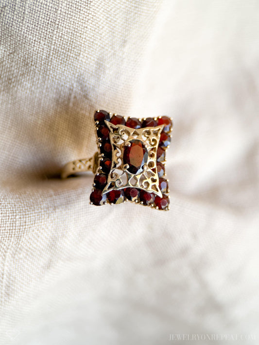Vintage Garnet Halo Gemstone Ring in 14k Gold, Vintage Jewelry from the 1980s - Timeless, Sustainable, @JewelryOnRepeat