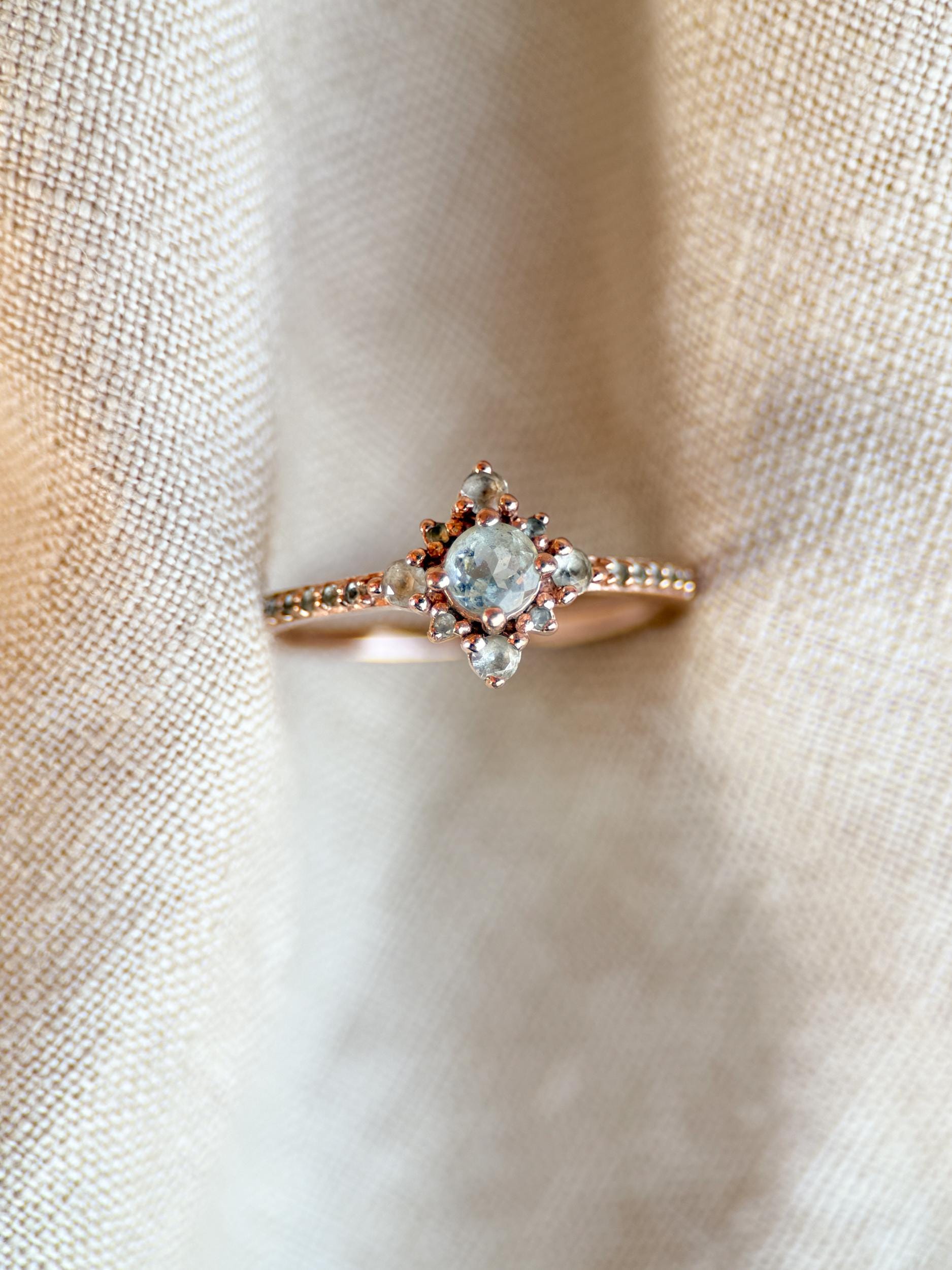 Vintage 1990s Blue Topaz Engagement Ring, 10k Rose Gold, Halo Design • One-of-a-kind Vintage Jewelry