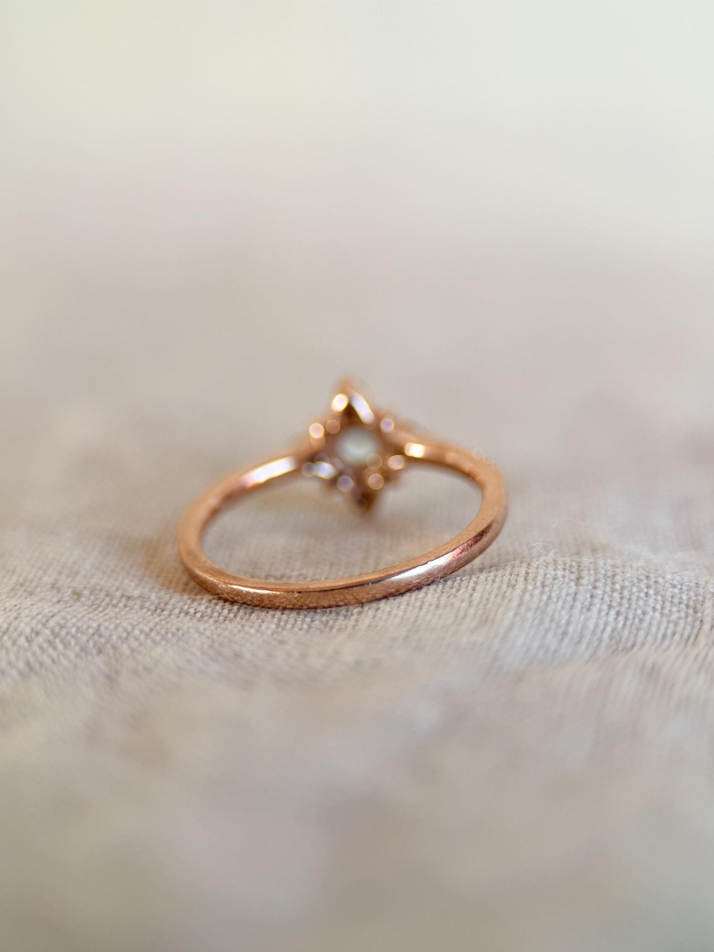 Vintage 1990s Blue Topaz Engagement Ring, 10k Rose Gold, Halo Design • One-of-a-kind Vintage Jewelry