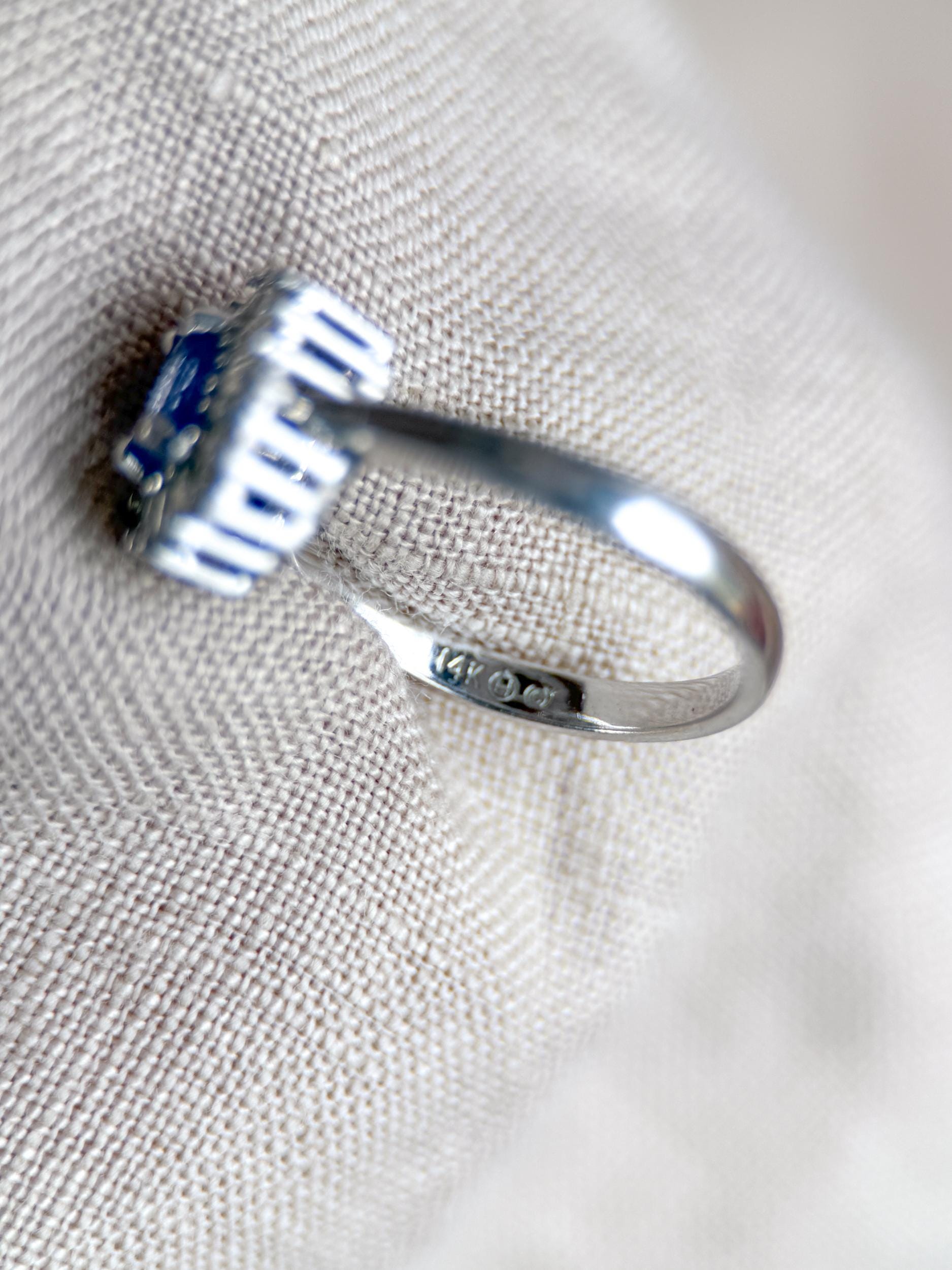 Vintage 1990s Tanzanite & Diamond Halo Ring in 14k White Gold - Timeless Sustainability • Vintage Fine Jewelry