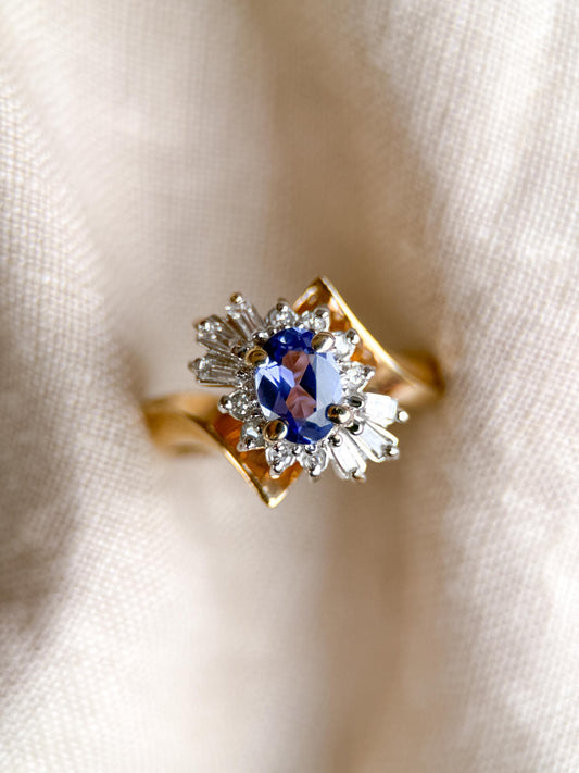 Vintage 1990s Tanzanite & Diamond Halo Ring in 14k Gold - Timeless Sustainability • Vintage Fine Jewelry