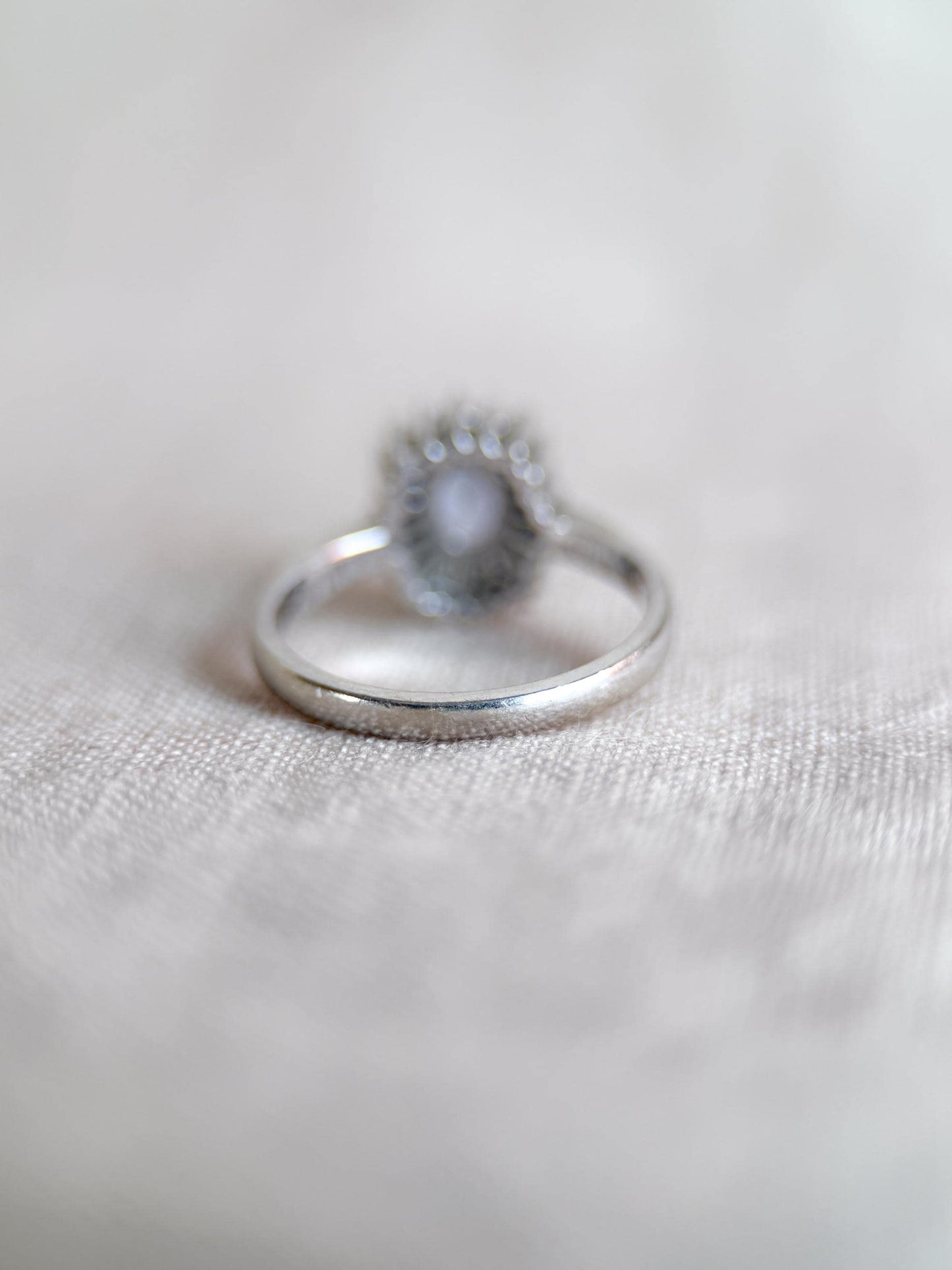 Vintage 1990s Tanzanite & Diamond Halo Ring in 14k White Gold - Timeless Sustainability • Vintage Fine Jewelry