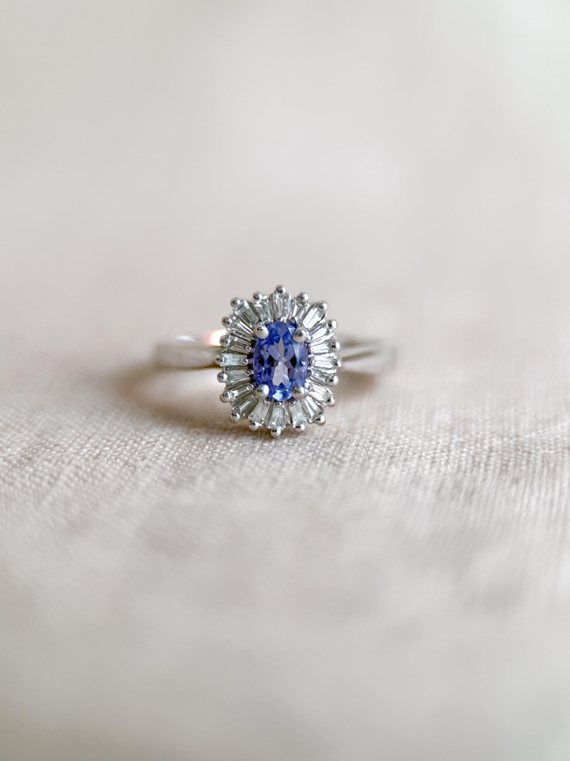 Vintage 1990s Tanzanite & Diamond Halo Ring in 14k White Gold - Timeless Sustainability • Vintage Fine Jewelry