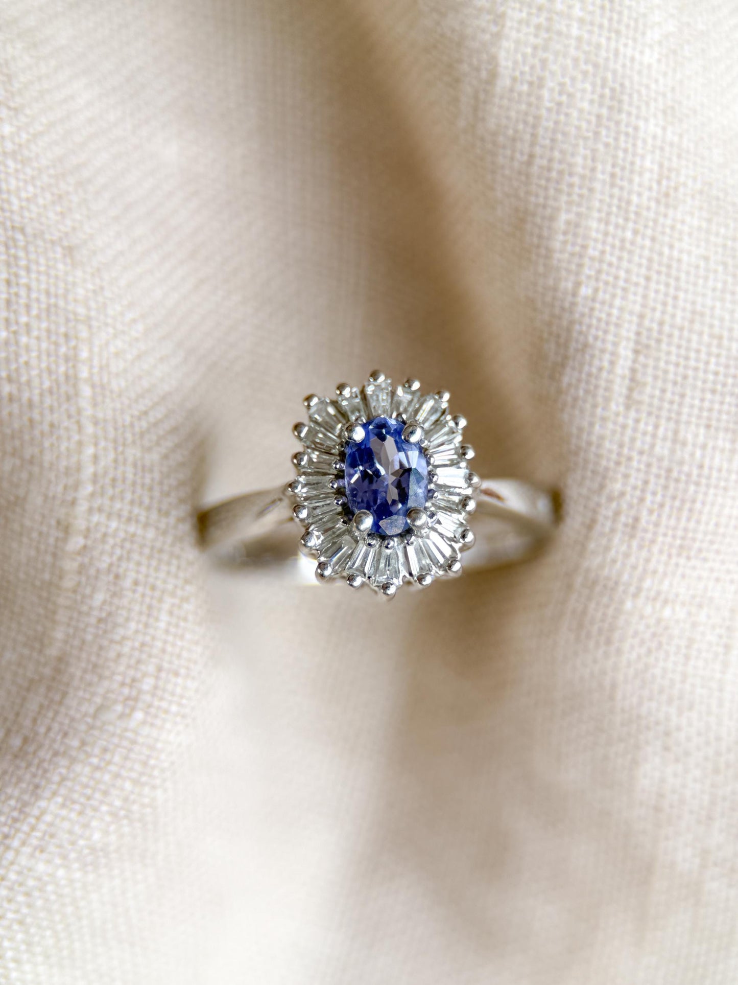 Vintage 1990s Tanzanite & Diamond Halo Ring in 14k White Gold - Timeless Sustainability • Vintage Fine Jewelry