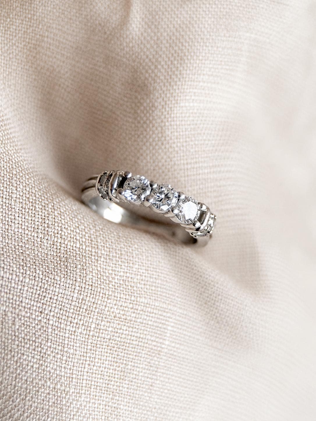 Vintage 1990s Diamond Three Stone Engagement Ring in Platinum
