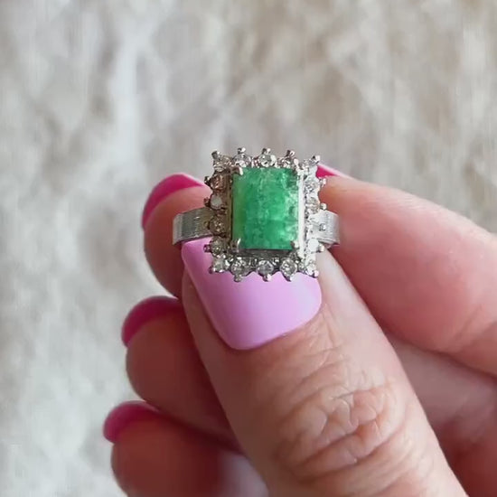 Vintage Emerald and Diamond Halo Gemstone Ring in 18k White Gold